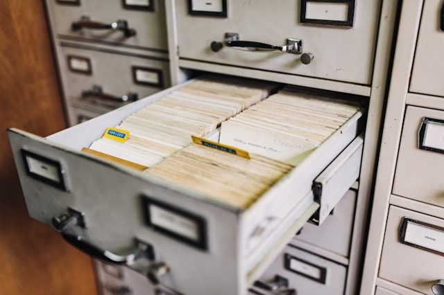 Close-up on an open file cabinet.